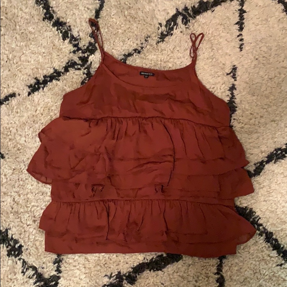 Burnt orange ruffled top